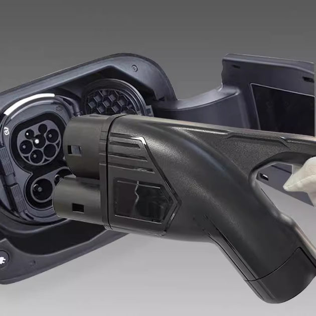 Close-up of a black CCS2 DC fast-charging connector for electric cars and EV charging cables